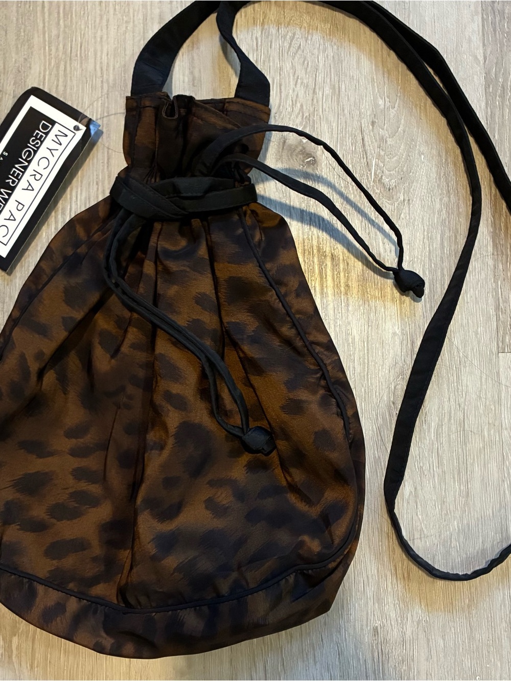 Mycra Pac Brown and Black Leopard Drawstring Shoulder Bag
